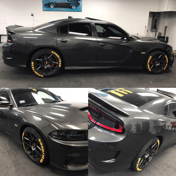 Dodge charger with tire shop stickers